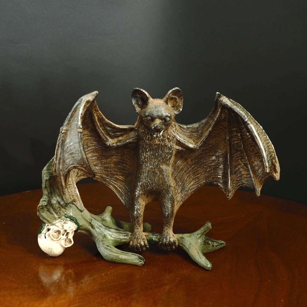 Rustic Bat Figurine with Skull Detail